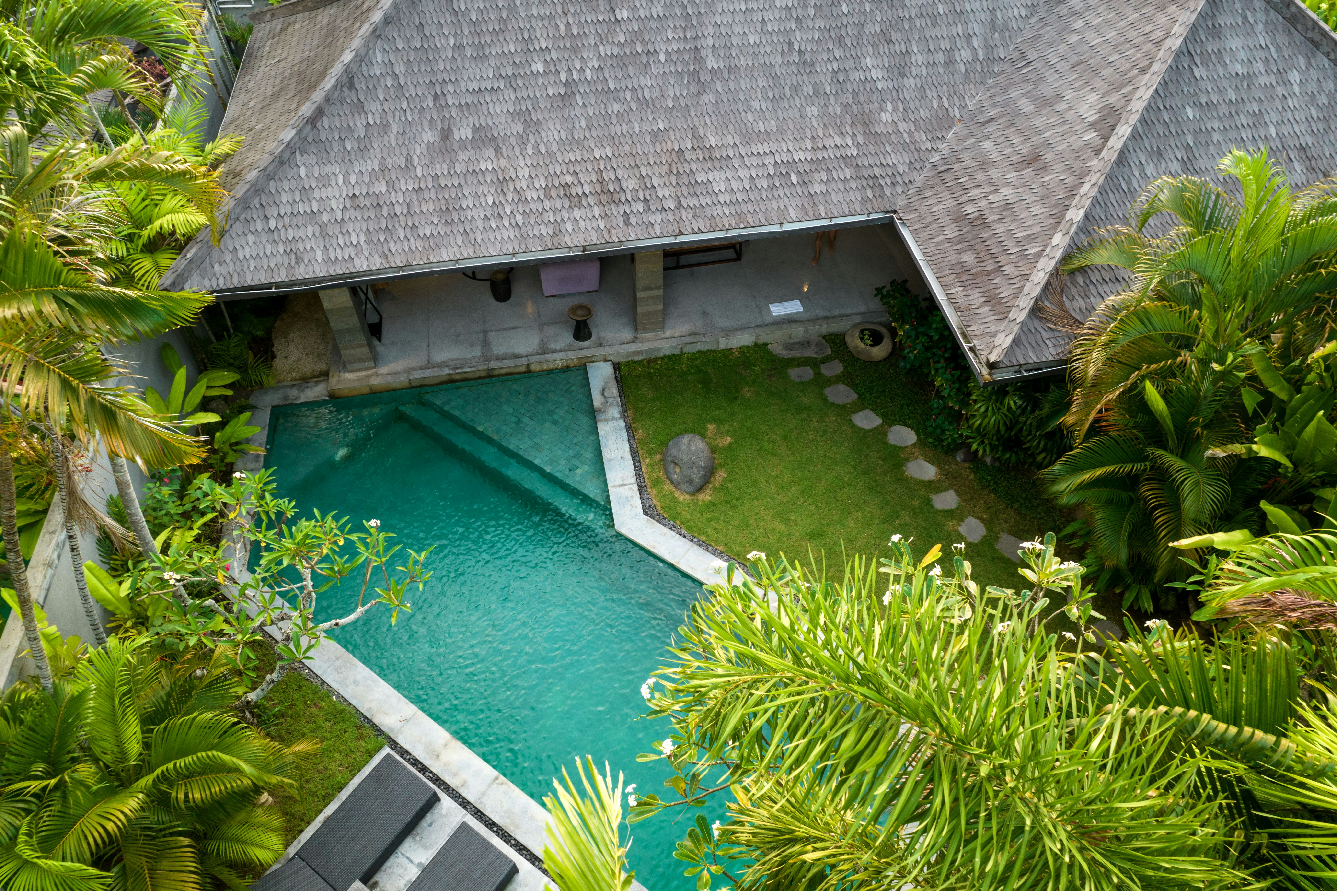 Private Bali villa pool from above — lush tropical garden exclusively yours